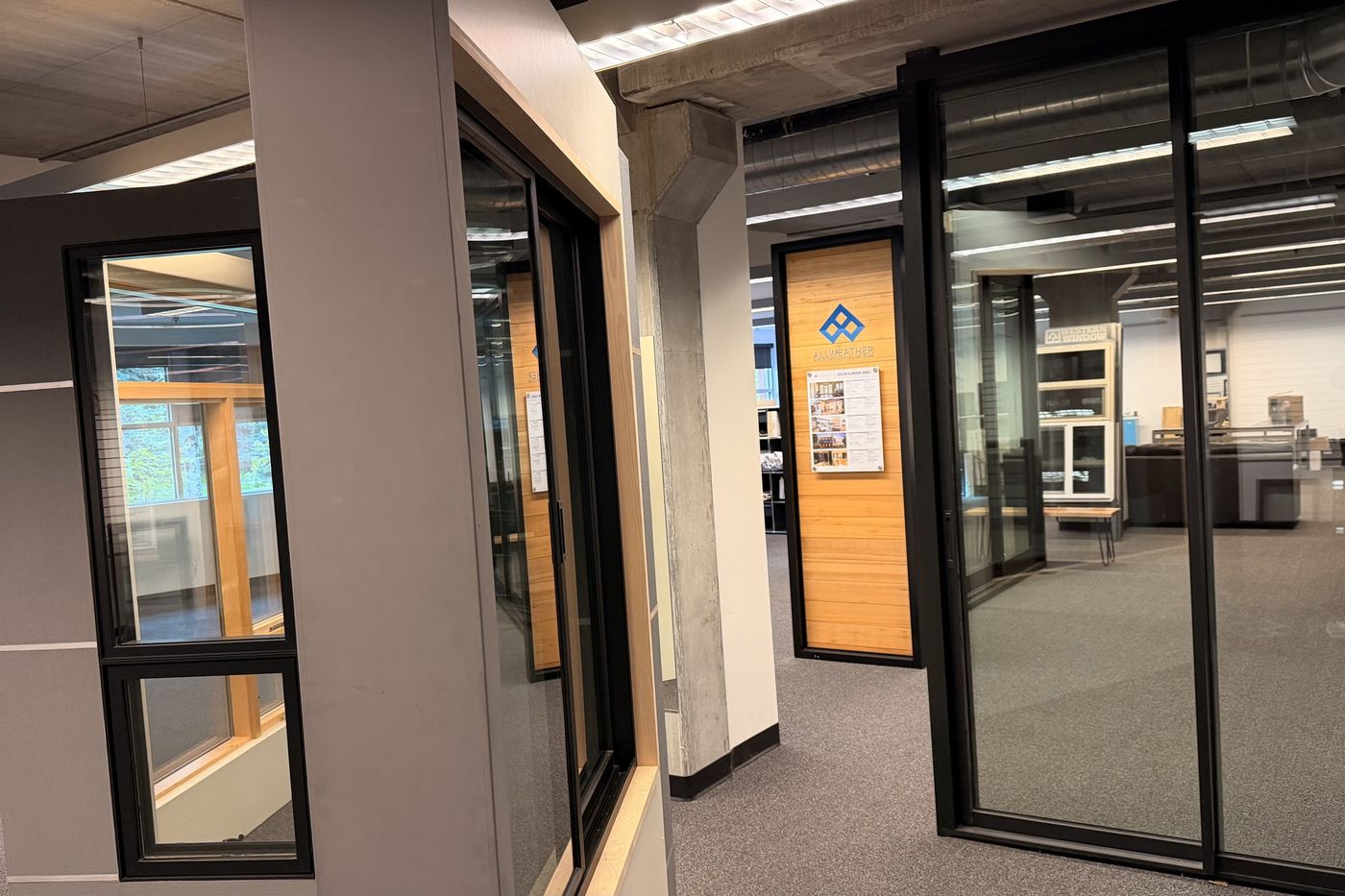 Full-size window and sliding door displays in the showroom